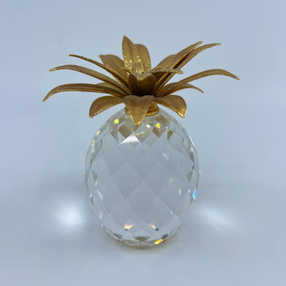 swarovski crystal pineapple paperweight with hammered brass toned leaves